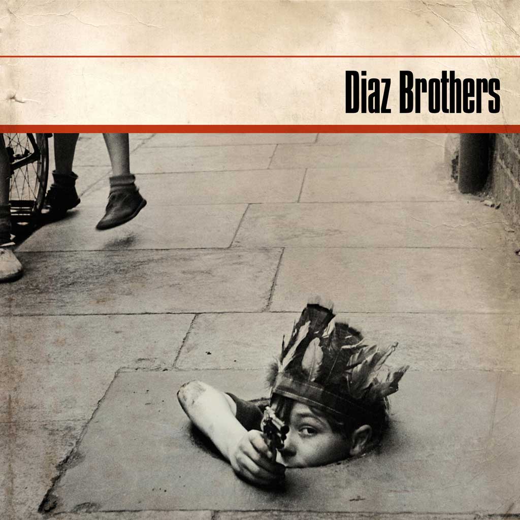 Picture of boy down drain for the Diaz Brothers album cover