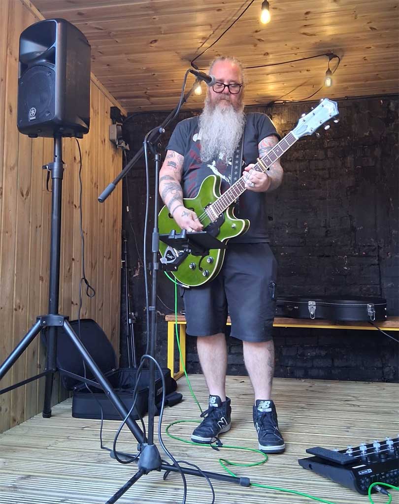 Photo of guitarist Chewie