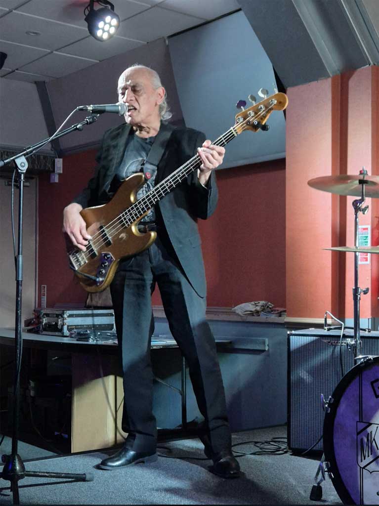 Photo of bass player from James Oliver Band