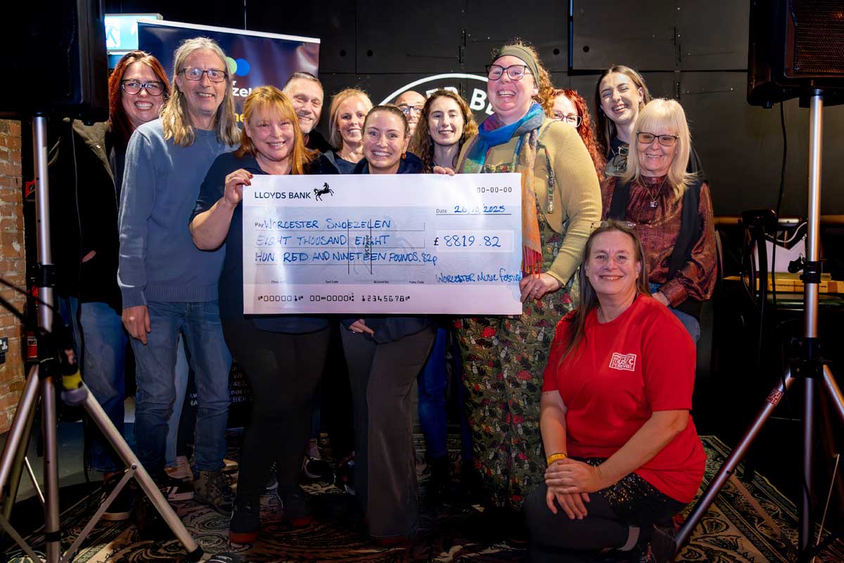 Photo of charity cheque being presented to Worcester Snoezelen