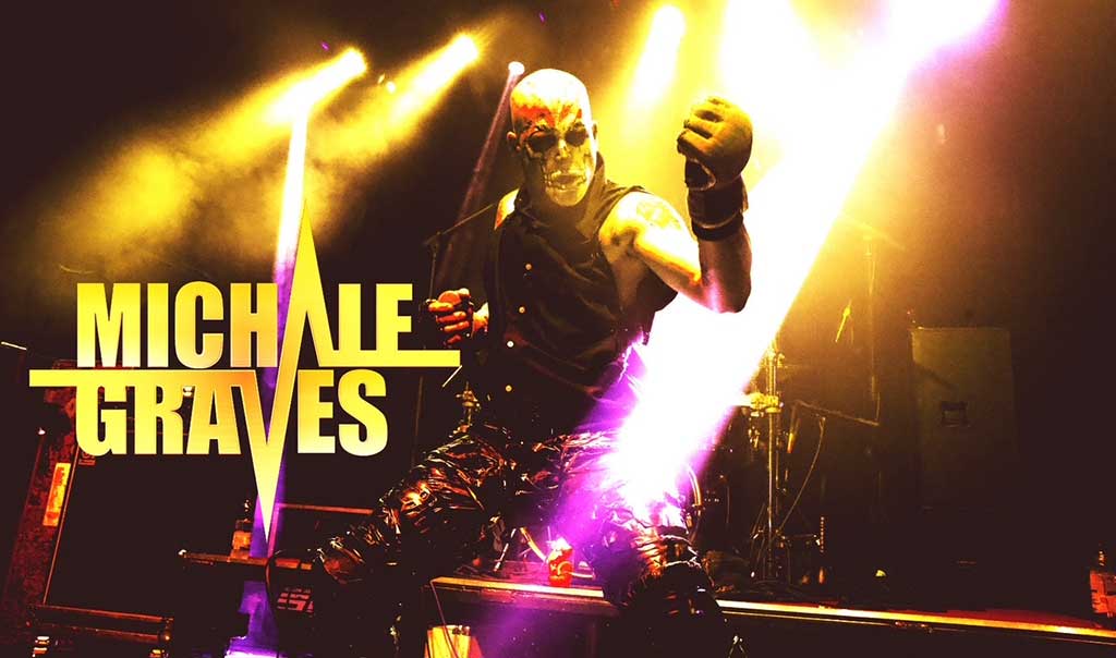 Photoo of Michale Graves on stage